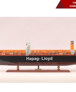The wooden model ship, handcrafted by the skilled hands of Vietnamese artisans, is proudly displayed at the Gia Nhien wooden ship showroom.