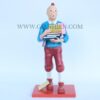 Tintin Statue Of Boy Holding Book