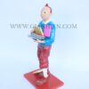 Tintin Statue Of Boy Holding Book