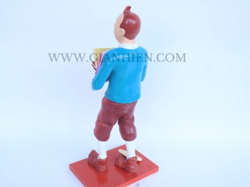 Tintin Statue Of Boy Holding Book