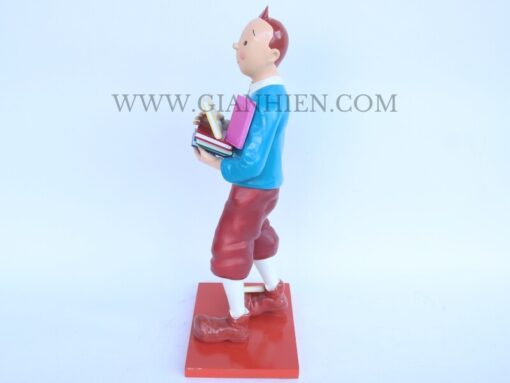 Tintin Statue Of Boy Holding Book