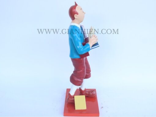 Tintin Statue Of Boy Holding Book